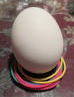 輪ゴムで卵の転落防止の写真